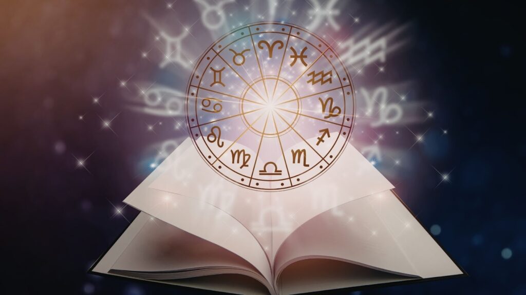 一本打開的空白書，上方懸浮著一個發光的、帶有十二星座符號的金色星盤，背景是閃爍的星空。